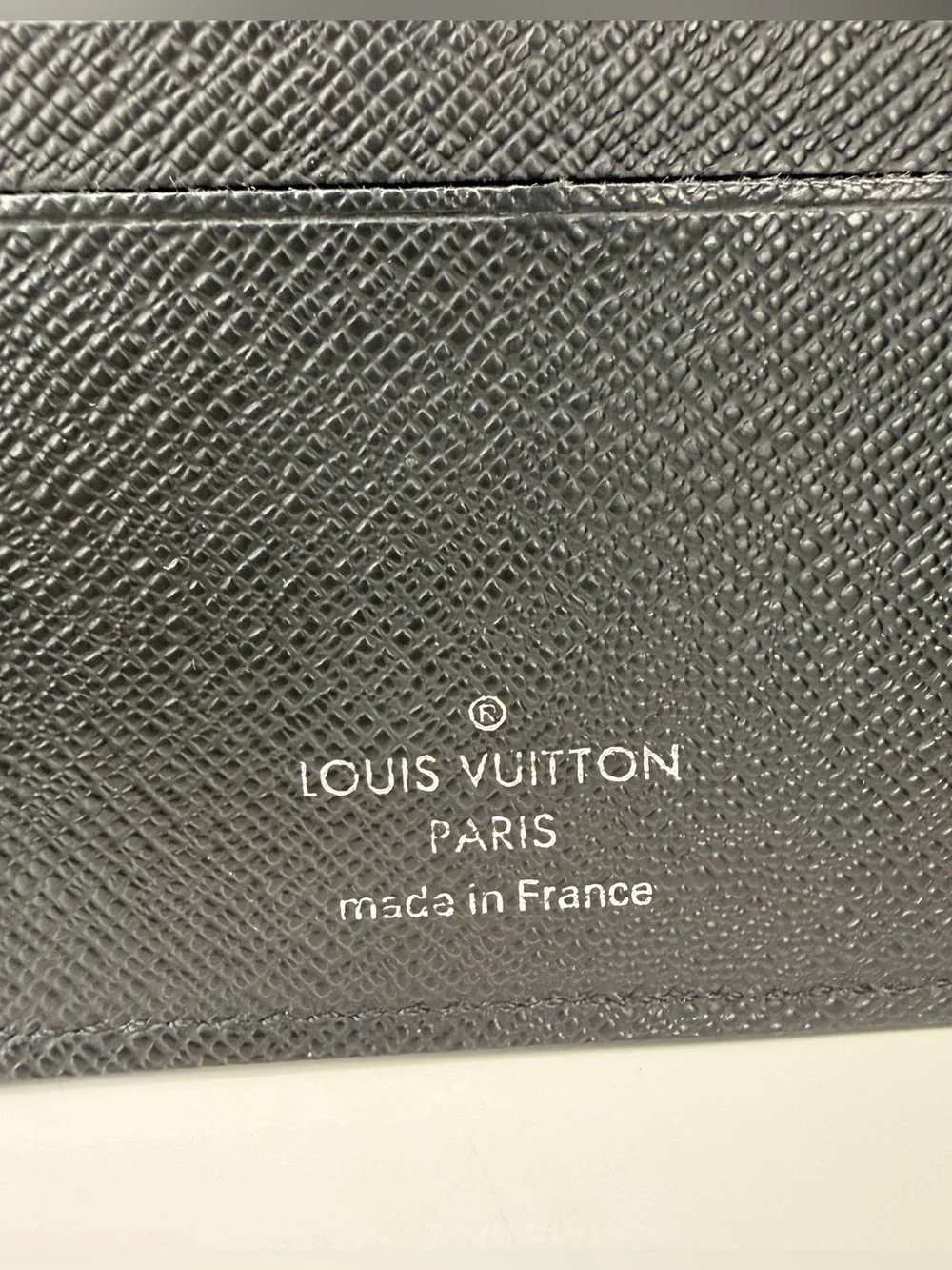 Authentic Louis Vuitton Black Epi Leather Bi-Fold Wallet